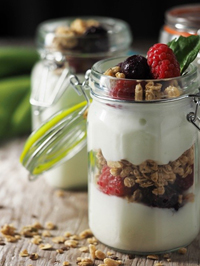 Mason jar berry parfait. Affordable and quick breakfast recipes for children from Rising Star Academy in Gainesville, Fl